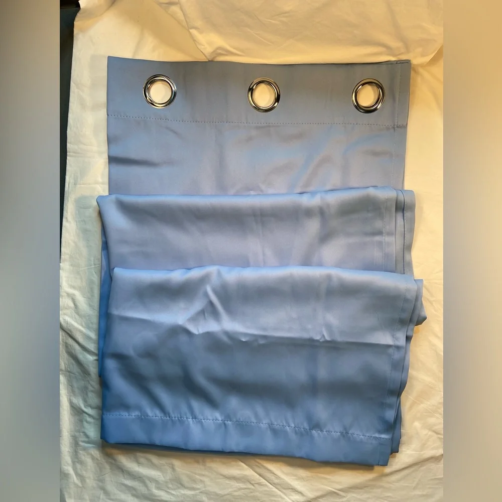 Curtain single panel, light blue, silver tone grommets. 42” x‎ 82”